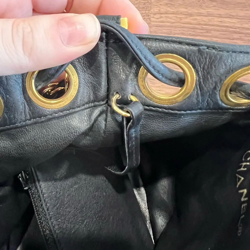 CHANEL Black Quilted Leather Drawstring Bucket Bag with Gold Hardware